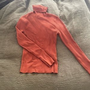 Burnt orange fitted turtleneck
